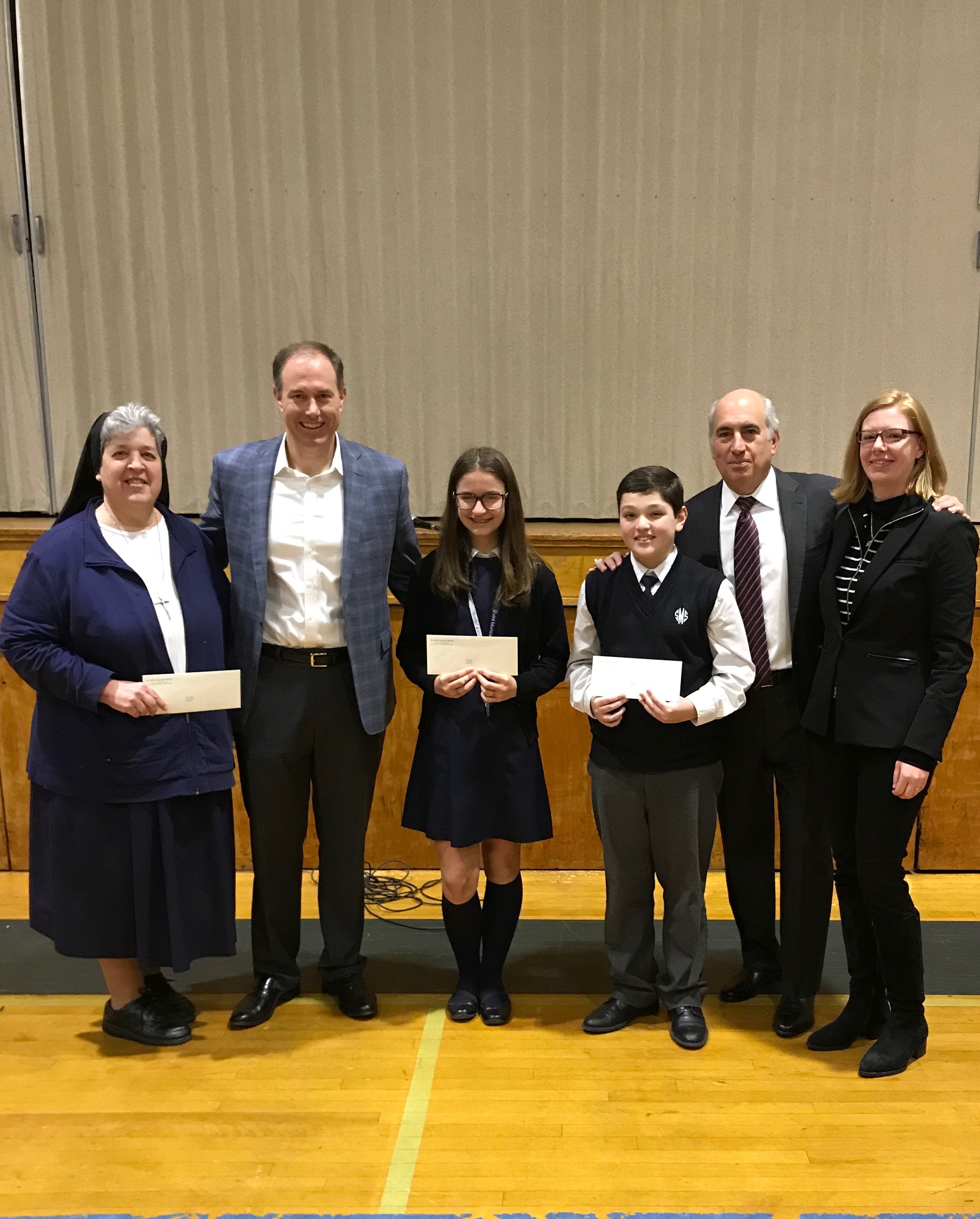 Cosmo and Morgan DeNicola Present Scholarship Recipients
